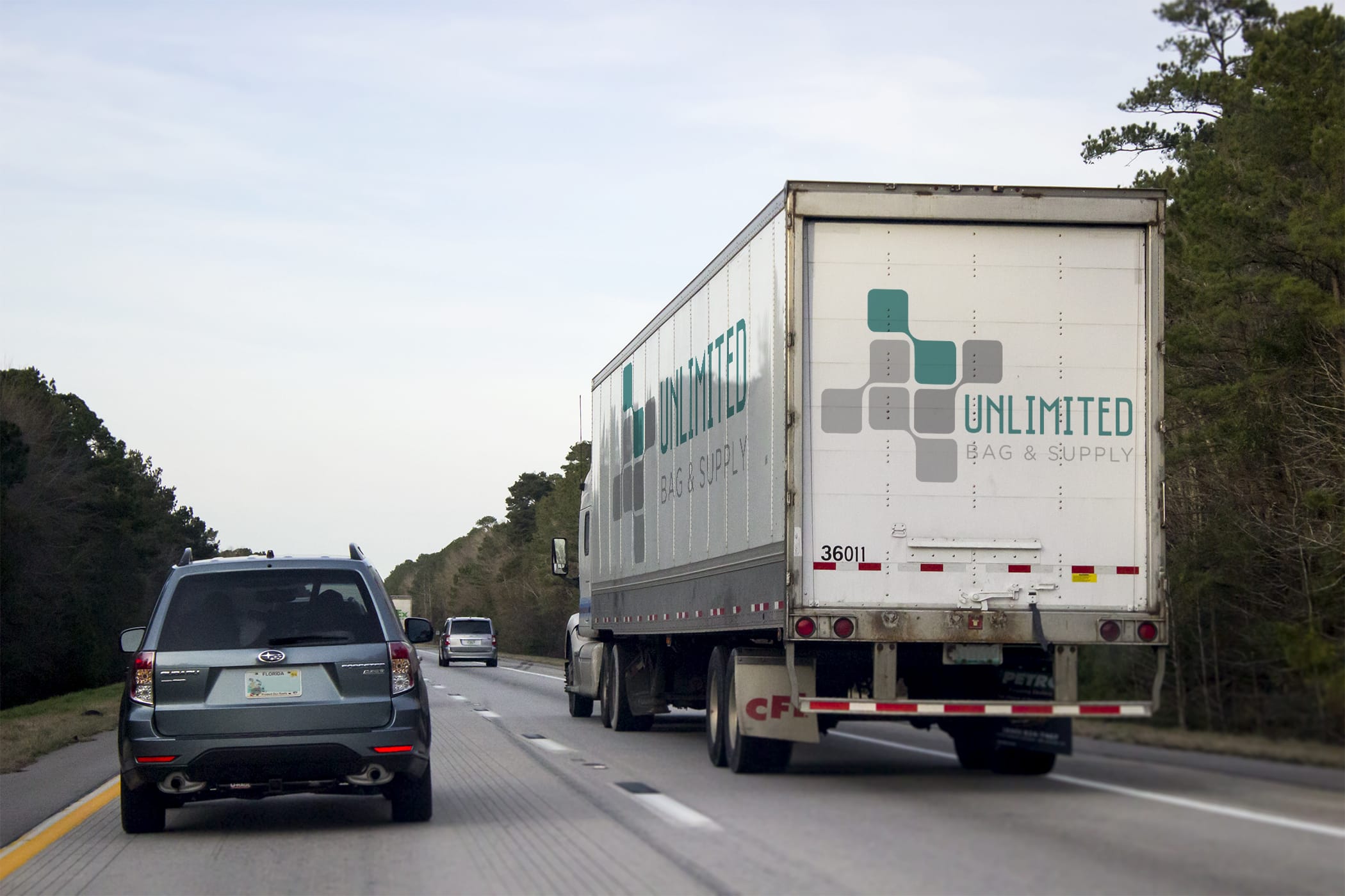 Unlimited Bag's delivery truck driving on a highway